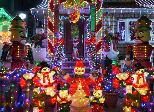 Think beyond simple string lights; consider using projectors to create dynamic images on your home’s façade or yard.