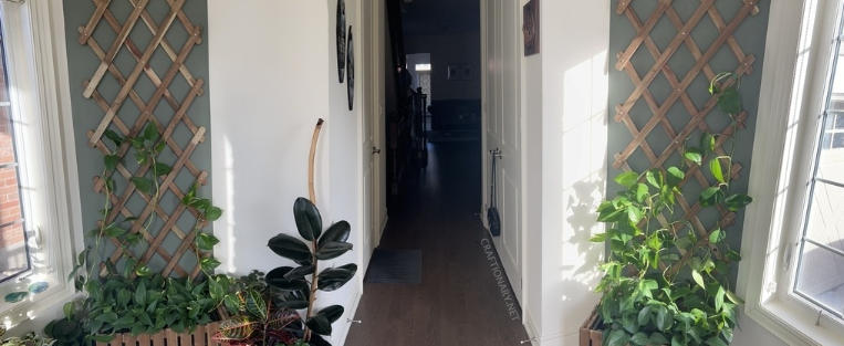 Minimalist Entrance Decor Using Sculptures and Planters