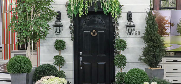 Front Door Decor Ideas Using Sculptures and Potted Trees