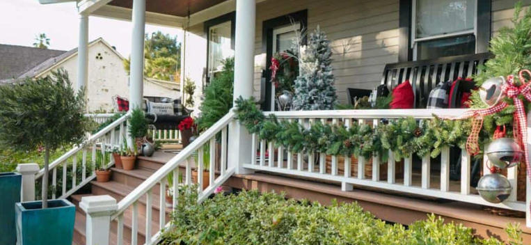 How to Use Sculptures to Anchor Your Front Porch Decor
