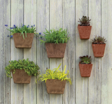 Outdoor wall decor with hanging planters