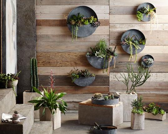 Outdoor wall decor with vertical planters