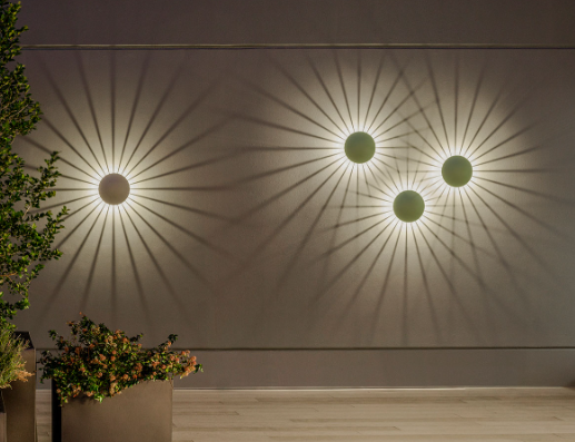 Outdoor wall decor with artistic lighting