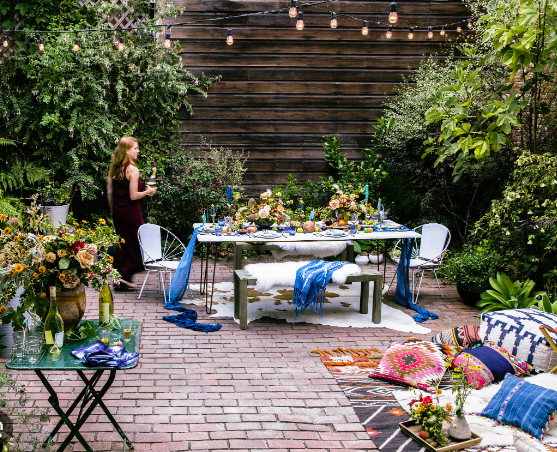 Outdoor wall decor with floral arrangements