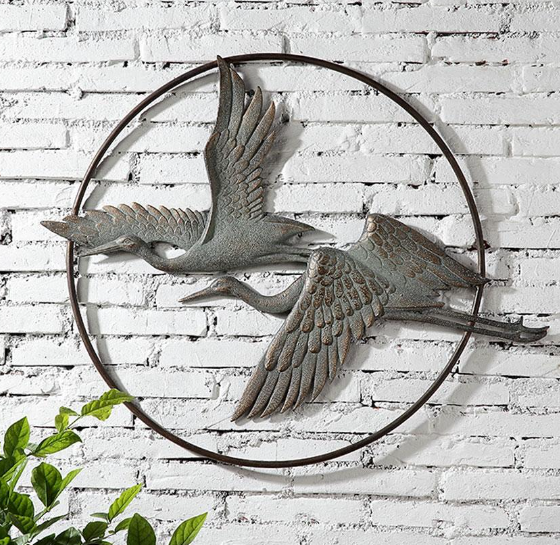 Outdoor wall decor for elegant outdoor spaces