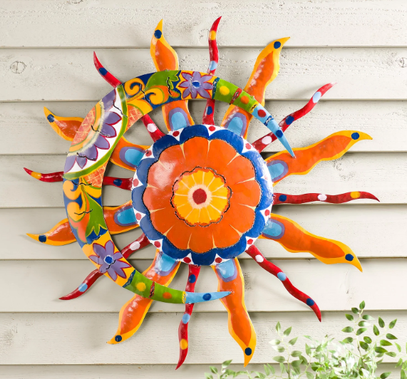 Outdoor wall decor with decorative accents